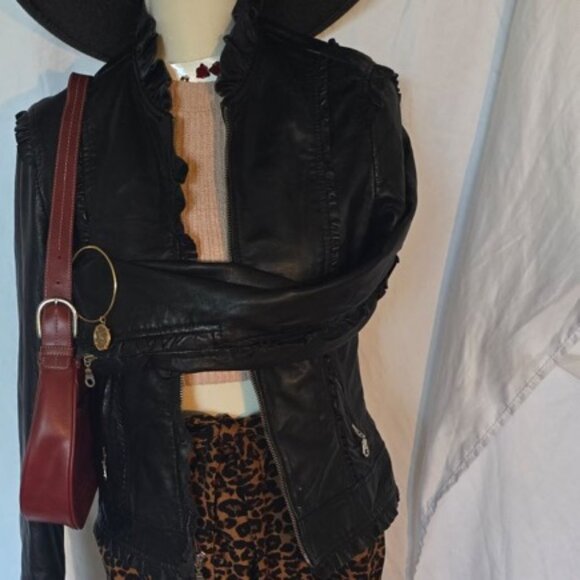 Leather jacket with cheetah print lining on the inside. Lots of frilly detail. - Picture 2 of 2